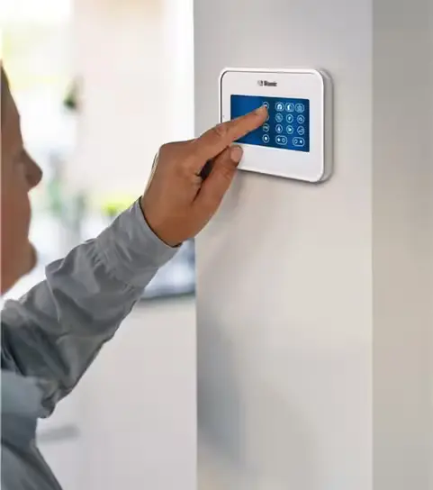Visonic alarm keypad used with a customer-owned security system