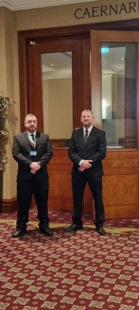 Hotel security officers carrying out an internal overnight patrol