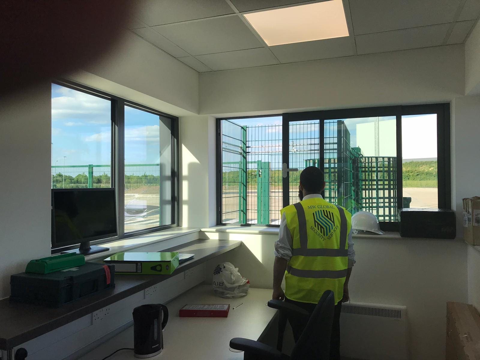 MW Global security officer carrying out gatehouse and access-control duties