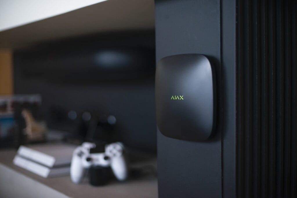 Modern Ajax alarm hub installed as a replacement security system