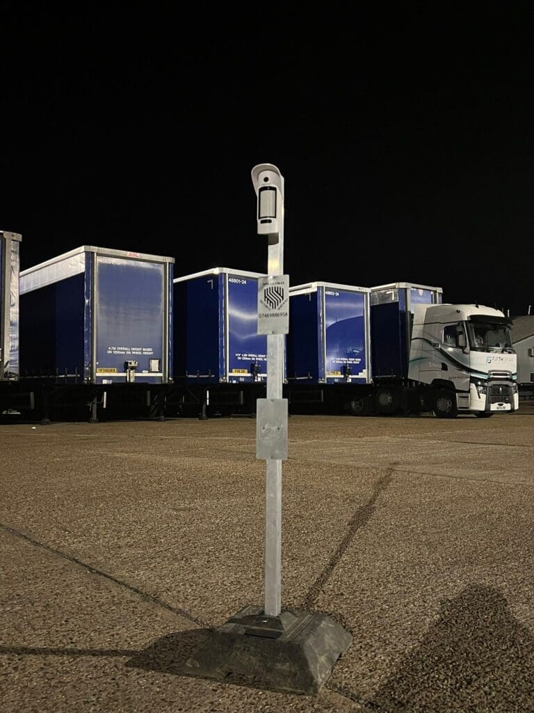 Temporary outdoor alarm detector protecting a trailer yard at night