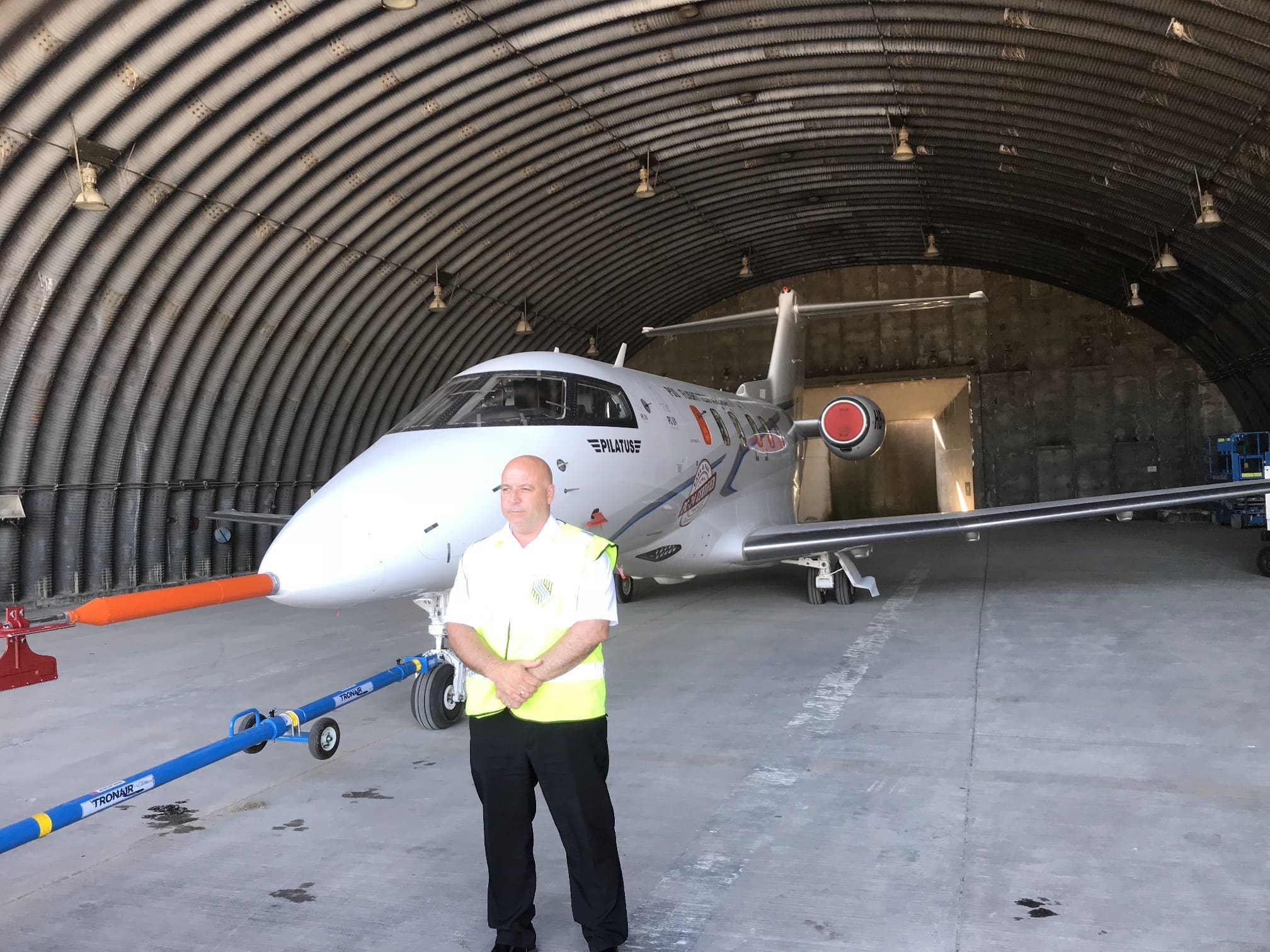 Security officer working in a controlled aviation environment