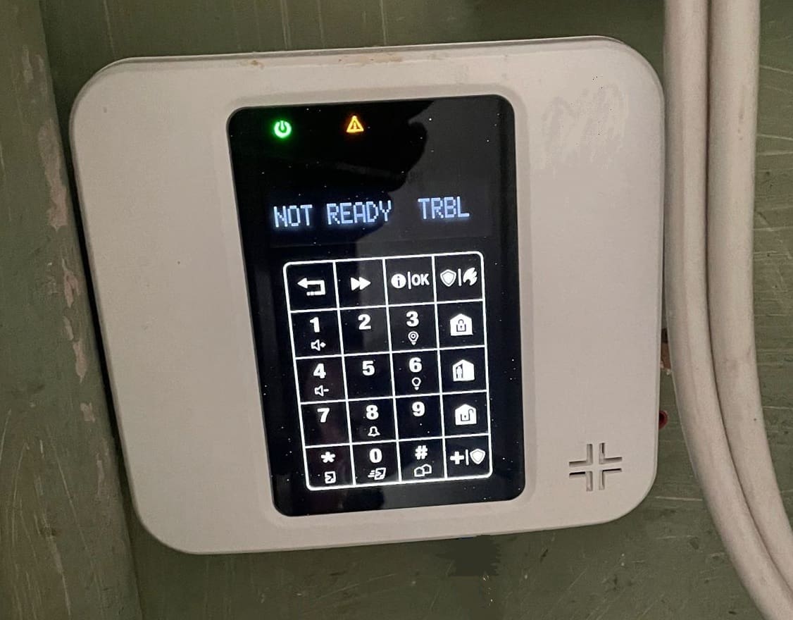 Existing intruder alarm keypad assessed for servicing or system upgrade