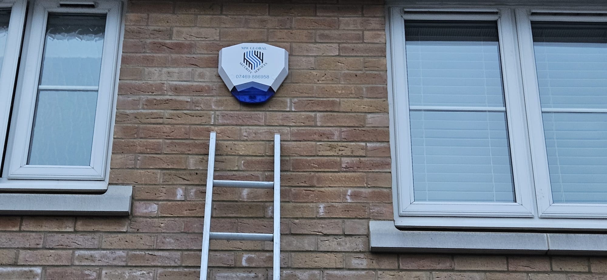 External alarm siren installed on a residential property in Suffolk