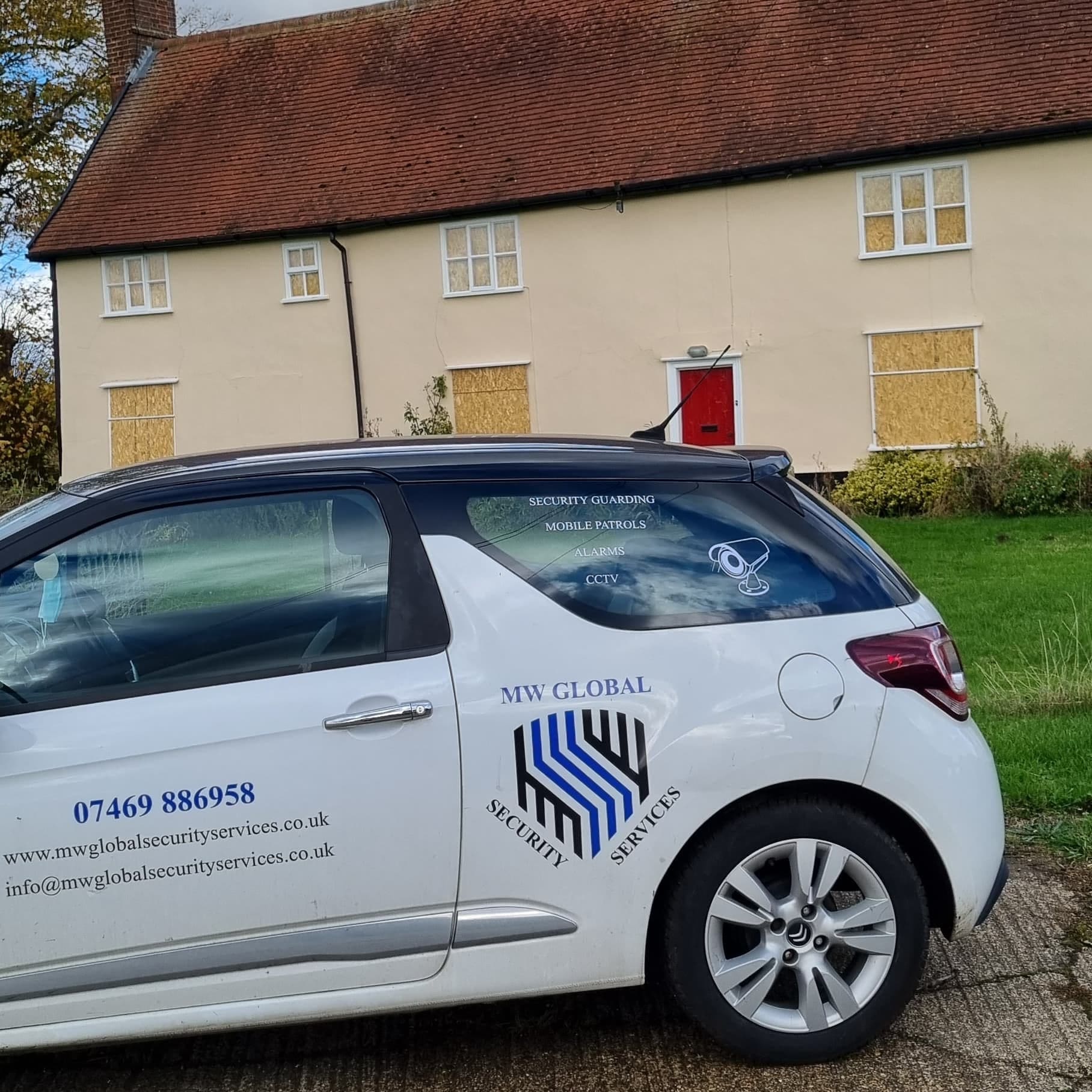 MW Global Security Services mobile patrol vehicle at a secured property