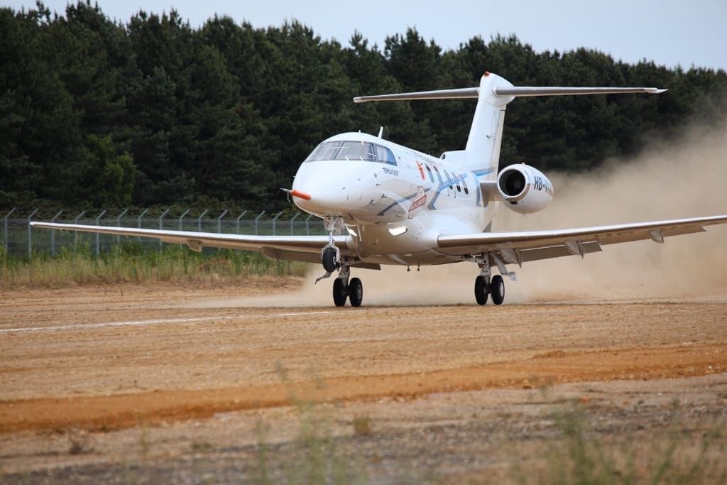 Aircraft operating from an airfield runway during specialist aviation activity in Suffolk