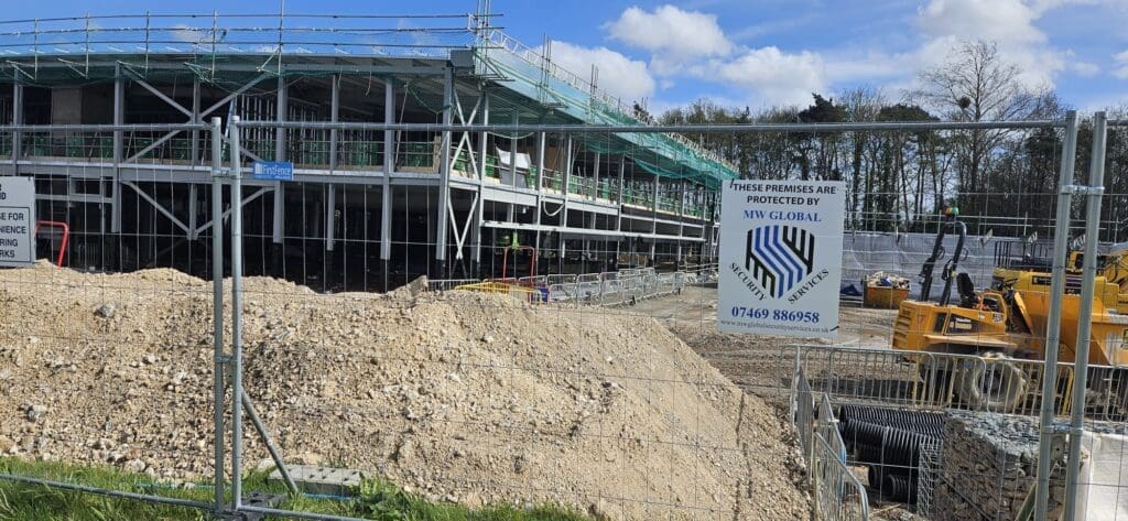 Construction site with plant and MW Global Security perimeter protection